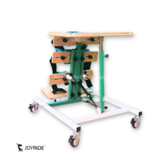 Joyride Prone Standing Frame (6) Side angled view of the Joyride Prone Standing Frame displaying adjustable support brackets, standing platform, padded positioning supports, and lockable caster frame.