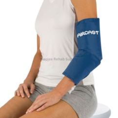 Aircast elbow cryo cuff fitted around the elbow joint providing targeted cold therapy and compression support during recovery.