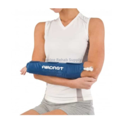 Woman wearing Aircast wrist cryo cuff delivering targeted cold compression therapy for wrist rehabilitation and inflammation relief.