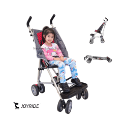 Child seated comfortably in the Joyride CP Stroller demonstrating supportive pediatric positioning, safety harness, and smooth mobility for outdoor use.