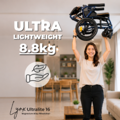 Lynx UltraLite 16 Magnesium Wheelchair – Easy One-Hand Lift Woman effortlessly lifting the 8.8kg Lynx UltraLite 16 magnesium wheelchair overhead to demonstrate its ultra lightweight construction.